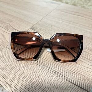 Prada Women’s Sunglasses PR15W Tortoise Caramel / Powder
NO CASE